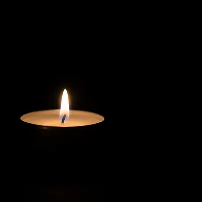 Single Candle Against Vast Darkness