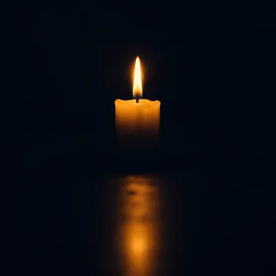 Single Candle of Courage in Darkness