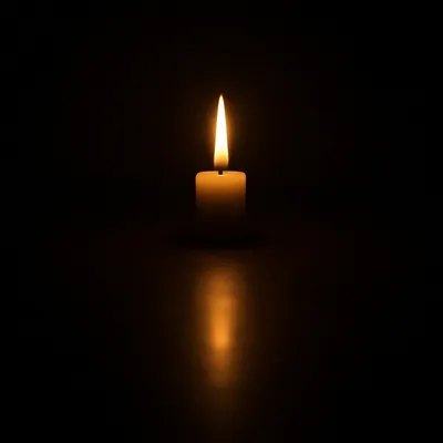 Single Candle of Courage in Darkness