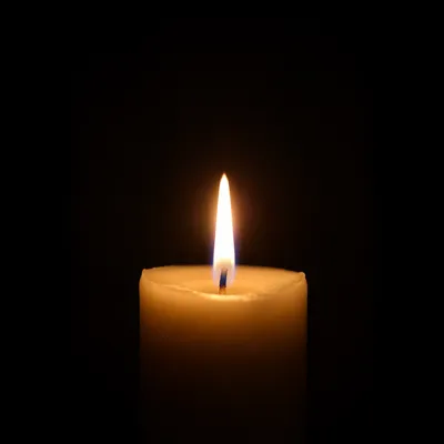 Single Candle of Courage in Darkness