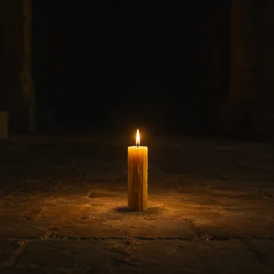 Single Candle in Vast Darkness