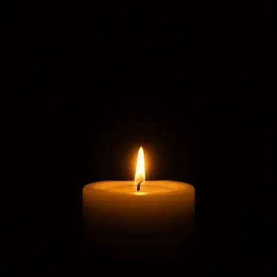 Single Candle Courage in Vast Darkness