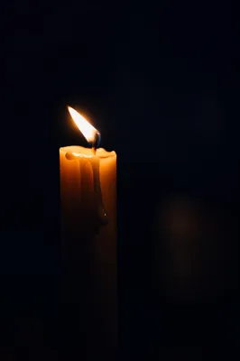 Single Candle of Courage in Darkness