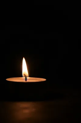 Single Candle of Courage in Darkness