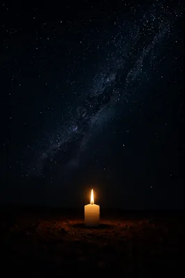 Single Candle of Courage Beneath Stars