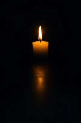 Single Candle of Courage in Darkness