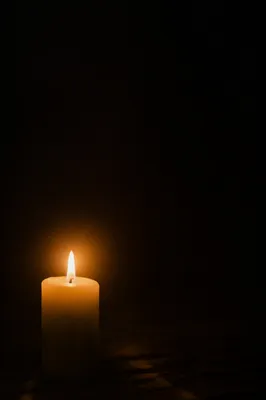 Single Candle of Courage in Darkness