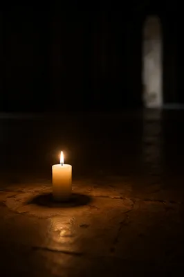 Single Candle of Courage in Darkness