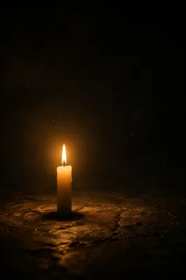 Courage Candle in Vast Darkness
