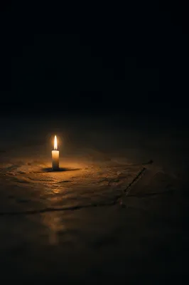 Single Candle of Courage in Darkness