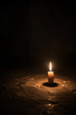 Single Candle of Courage in Darkness