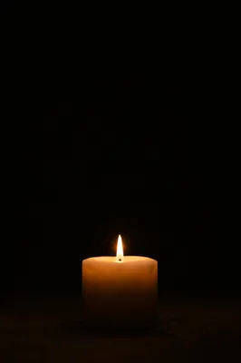 Single Candle of Courage in Darkness