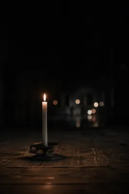 Steady Candle Flame in Vast Darkness