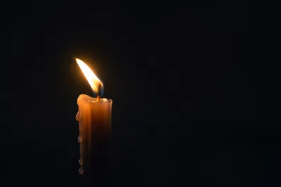 Single Candle of Courage in Darkness