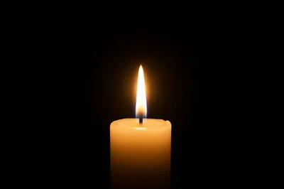 Single Candle of Courage in Darkness