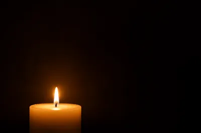 Single Candle of Courage in Darkness