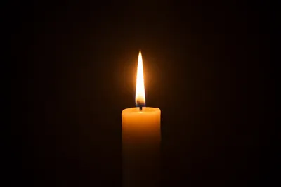 Single Candle of Courage in Darkness