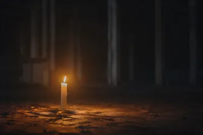 Single Candle of Courage in Darkness