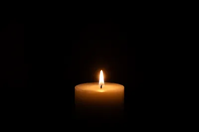 Courage Candle in Vast Darkness