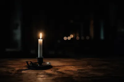 Single Candle of Courage in Darkness
