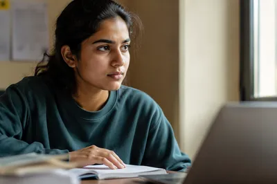 Focused University Student by Window
