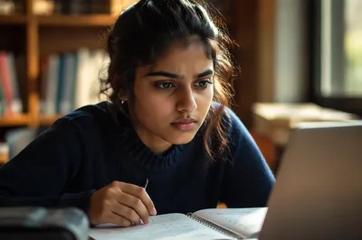 Determined Student Studying by Library Window