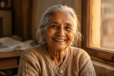 Smiling Elderly Woman by Sunlit Window