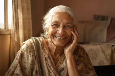 Beaming Elderly Woman by Sunlit Window
