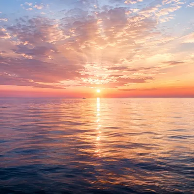 Eternal Sunrise Over Calm Ocean Horizon