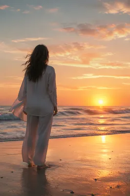 Solitary Figure Watching Sunrise Over Ocean