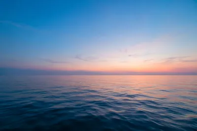 Eternal Sunrise Over a Calm Ocean