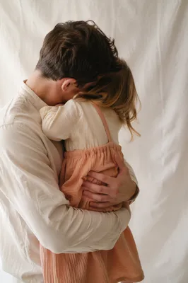 Tender Father Daughter Embrace in Soft Light