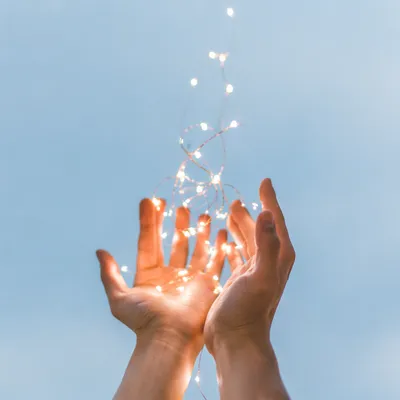 Open Hands Releasing Lights of Forgiveness