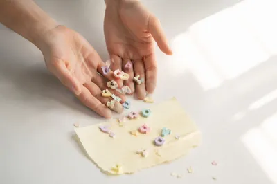 Hands Releasing Past Hurts in Gentle Light