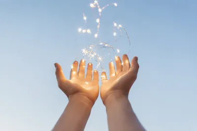 Open Hands Releasing Lights of Forgiveness