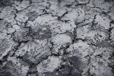 Grace Rain on Cracked Dry Earth
