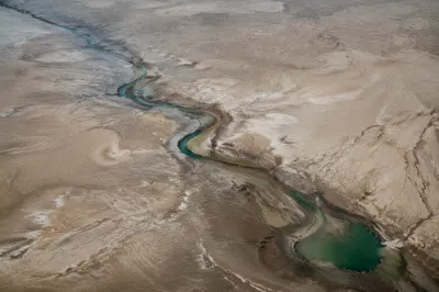 Grace Rain Renewing a Desert Plain