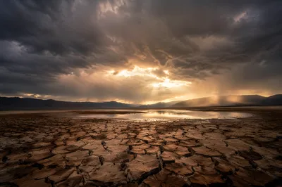 Grace Rain Over Parched Desert Valley