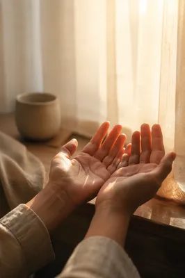 Open Hands in Morning Sunlight