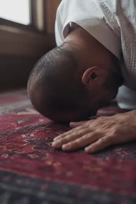 Humble Prayer on Red Woven Rug