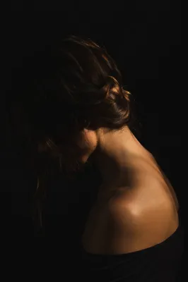 Bowed Head in Gentle Shadow Light
