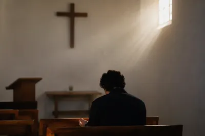Humble Prayer in Gentle Chapel Light