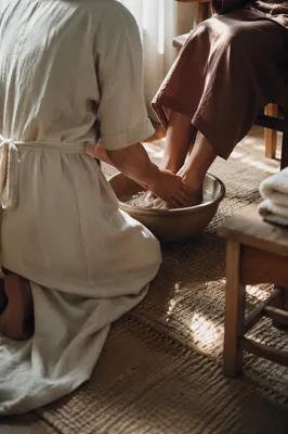 Humble Foot Washing in Morning Light