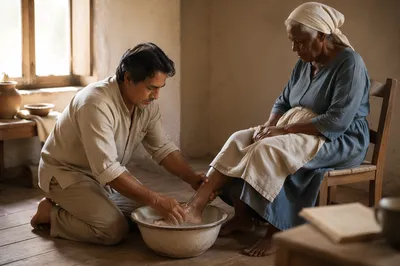 Man Washing Elderly Woman's Feet Indoors