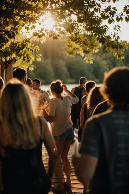 Joyful Sunlit Dancing on Lakeside Deck