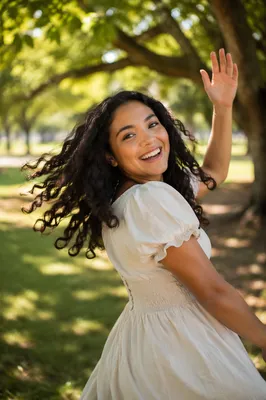 Joyful Woman Twirling in Sunlit Park