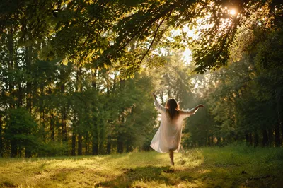 Joyful Silhouette Beneath Summer Sunlight