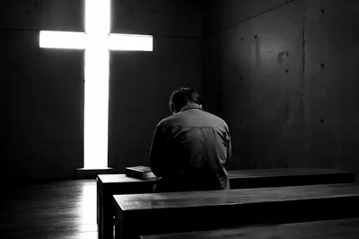 Lonely Figure in Chapel with Hope