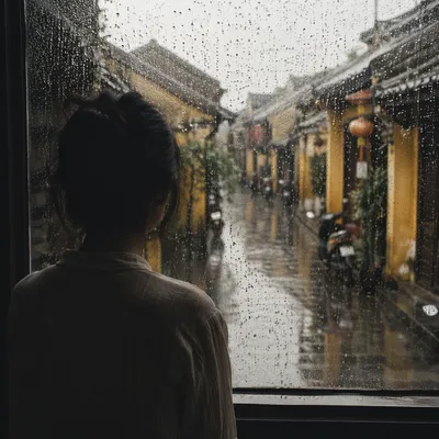 Lonely Figure at Rainy Window