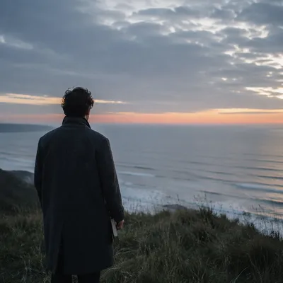Longing Figure Facing Ocean Dawn Horizon